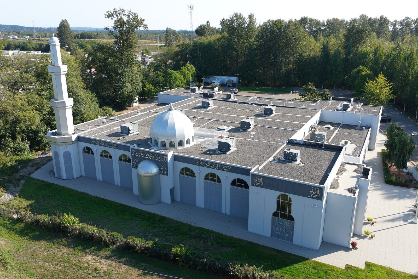 Aerial view of the mosque building, dome, and minaret