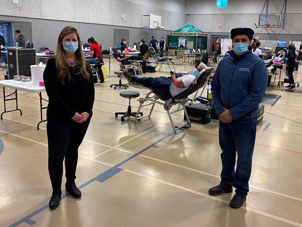 Volunteers and staff at a blood donation drive hosted at the mosque